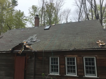 Old, weathered roof before replacement