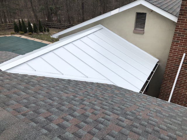 New white standing seam metal roof and new GAF Timberline Williamsburg Slate Shingles in Collegeville, PA. Project by XL Home Improvements.