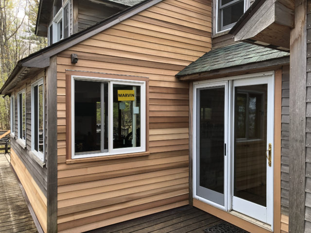 New Cedar Roofing and Siding on this lakeside camp