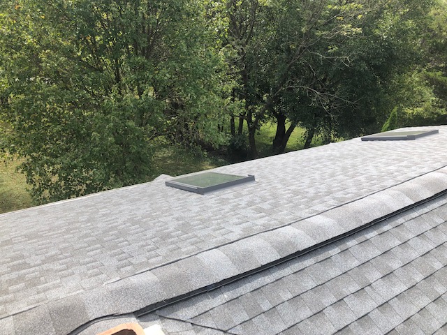 New Certainteed shingle roof with new Velux skylights. Project by XL Home Improvements.