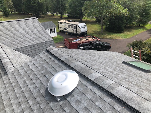 New Certainteed shingle roof with new Velux skylights. Project by XL Home Improvements.