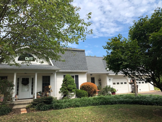 Residential shingle gambrel roof in Harleysville PA by XL Home Improvements.