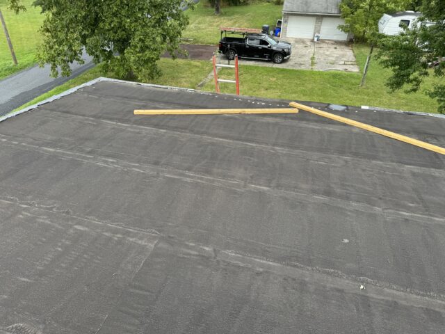 Flat roof with wind damage