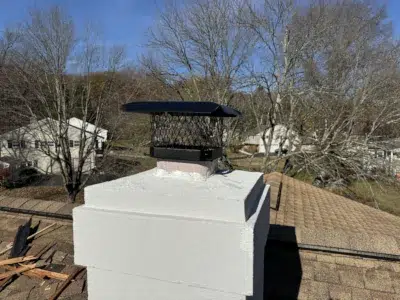New chimney cap installed on a residential home in King of Prussia, PA, providing improved protection against rain, debris, and animals.