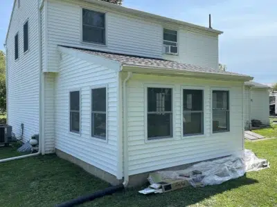 Completed siding installation on a new addition at a residential property in Downingtown, PA, featuring freshly installed siding surrounding the windows for a seamless, polished finish.