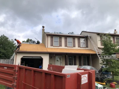 In-progress shingle roof replacement on a home in Harleysville, PA by XL Home Improvements.