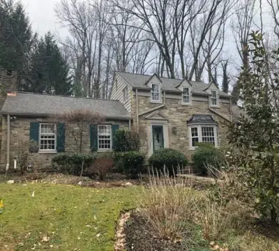 Cedar roof removal with new decking and Landmark Weathered Wood shingle installation on a residential home in Jenkintown, PA by XL Home Improvements.