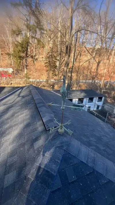 Outhouse roof in Schwenksville with new Tamko Heritage "Rustic Black" shingles installed to match the main house.