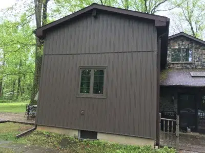 New board and batten siding installed on Trumbauersville PA home