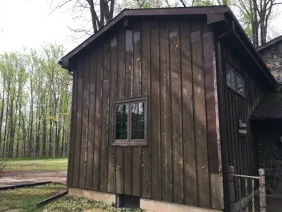 Old board and batten siding before replacement in Trumbauersville PA
