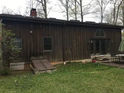 Weathered siding before replacement on Trumbauersville PA home
