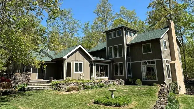 Completed fiber cement siding installation on a residential home in Green Lane, PA by XL Home Improvements