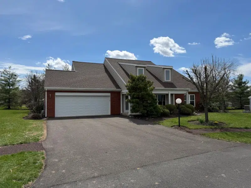 Completed roof replacement in Harleysville PA with Tamko Titan Rustic Redwood shingles front view