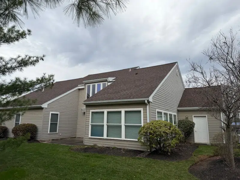 Rear view of completed roof replacement in Harleysville PA with new architectural shingles