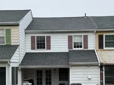 rear view of completed roof replacement on townhome in Schwenksville PA