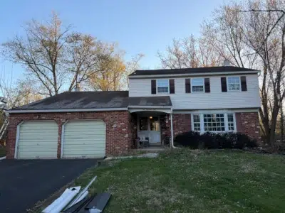 before roof replacement in Kulpsville PA showing front view of aging shingle roof