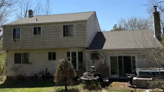 completed residential roof with Weathered Wood shingles in Montgomery County PA