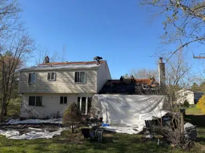 roof tear off in progress during residential roofing project in Kulpsville PA
