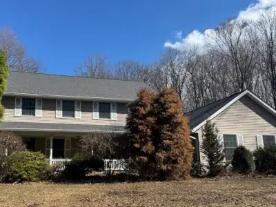 Roof and gutter replacement completed by XL Home Improvements in North Coventry PA on a two-story home