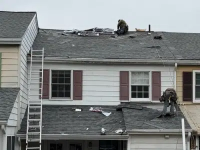 roof shingle installation on townhome in Schwenksville PA during replacement project