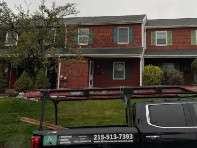 Schwenksville PA roof replacement before image of townhome with aging shingles