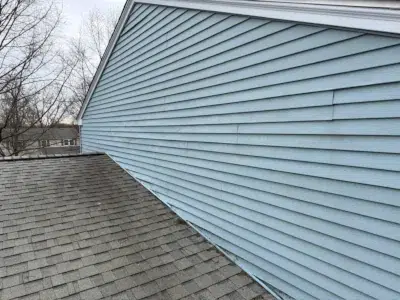 Completed siding repair with aligned panels in East Norriton Township PA by XL Home Improvements