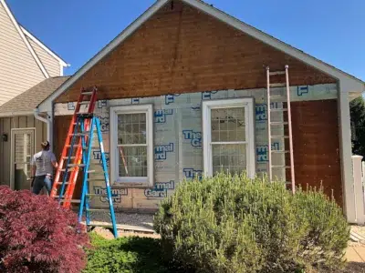 Siding replacement in progress with housewrap installation in Lower Salford Township PA by XL Home Improvements