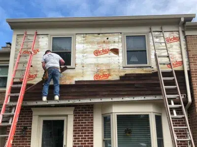 Siding replacement in progress on a residential home in Skippack, PA by XL Home Improvements